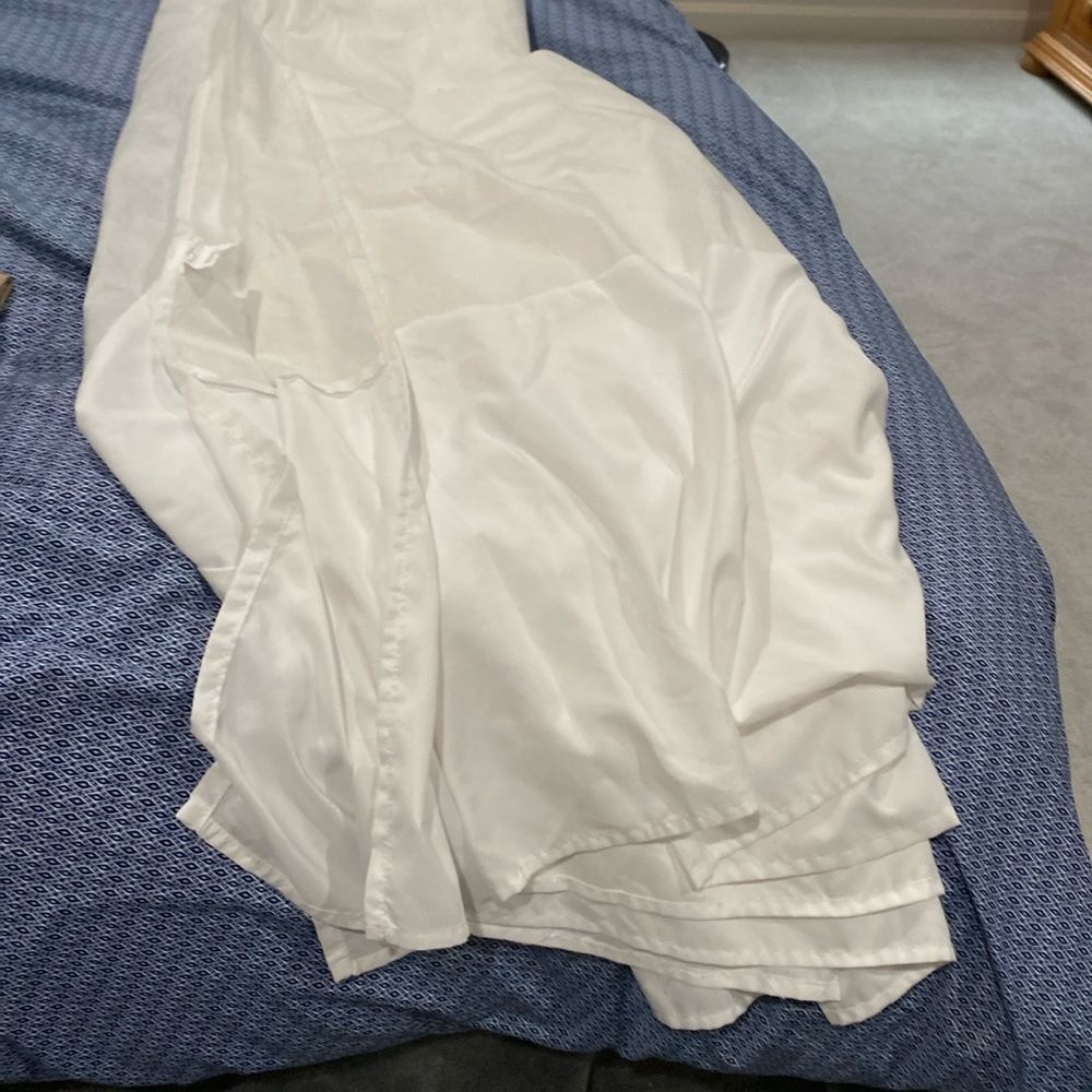 Walmart, brand dust ruffle, in white. Queen size in very good shape.